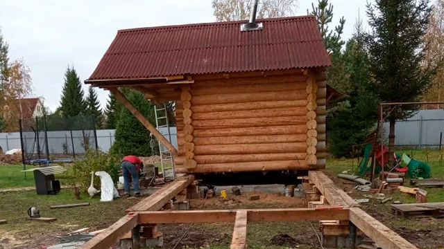 Фото: перенос дома по участку